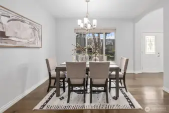 Another angle of the formal dining room showing the entry to the right.