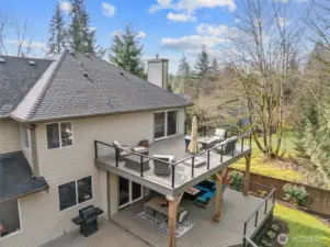 Second story deck is accessed from the primary bedroom.