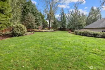 Property has several hidden sanctuaries, and this large flat lawn area is great for all the lawn games.