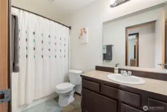 Main bathroom with large tub.