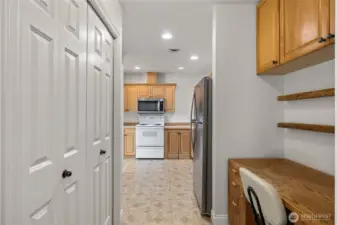 Utility closet and office space off the entry and kitchen.