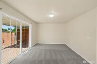 Living room with slider to back deck.