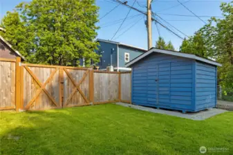 Large fully fenced lot, also has a shed for outside tools