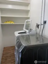 laundry room shelving and storage on the right side!
