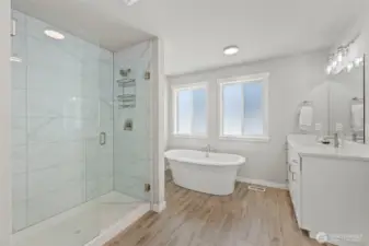 Free standing tub w/ 2 separate vanities