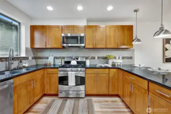 Beautiful granite, ample countertop space and storage