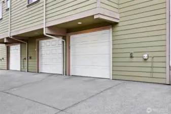 Garage parking with space for additional storage. Garage enters into Lower level.