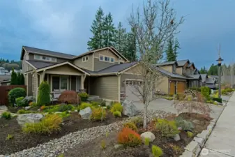 This gorgeous two-story craftsman home has the primary suite on the main floor.