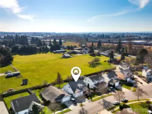 This is a sweet neighborhood with the perfect location backing up to an open manicured field offering nice privacy and views year round.