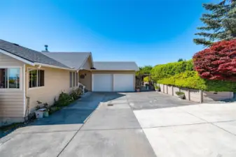 Two car garage with plenty of extra parking...