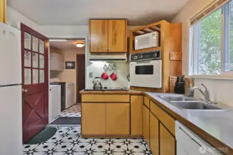 Cabin - Laundry room/mud room. Electric cooktop, stove, d/w and refrigerator.