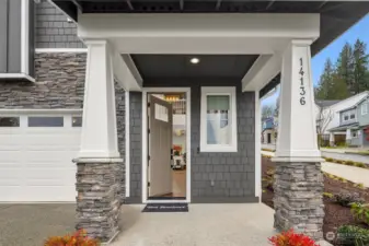 Welcoming covered entry porch - Photos of the Alabaster model home, used for representational purposes only. All colors, finishes, cabinetry, and design features will vary.