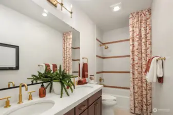 Upper level secondary bathroom - Photos of the Alabaster model home, used for representational purposes only. All colors, finishes, cabinetry, and design features will vary.