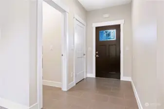 Broad front entry and convenient entryway closet