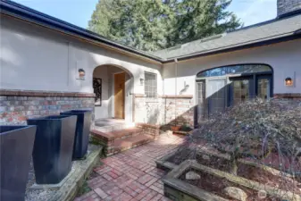 Extensive Hardscape and Multiple Courtyards.