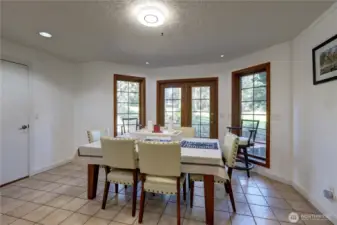 French Doors in the Dining Room Open to the Golf Course Patio.