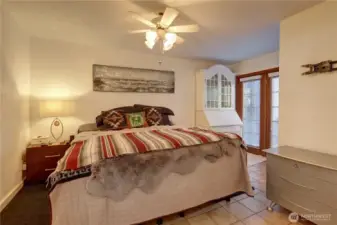 The Mini Suite Features a 3/4 Bath & French Doors Leading to the Private Courtyard.