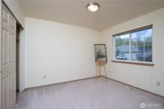 Second of three bedrooms.  Large closets can be found in all of the bedrooms.