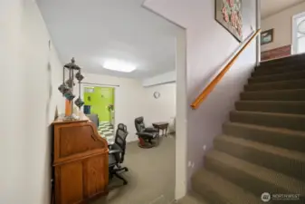 Downstairs to the right.