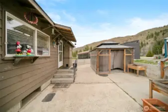 Out the back door and into the pergola that houses the hot tub. Hot tub stays with the home.