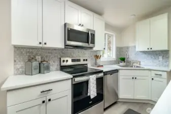 New quality cabinets and new stainless steel appliances.