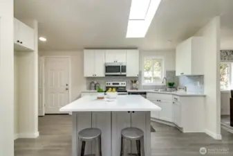 The new skylight makes the kitchen bright and beautiful