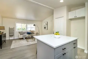 The kitchen island with breakfast bar also has great storage.