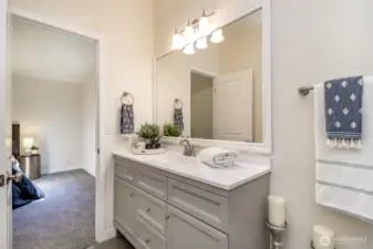 The new remodel of the primary suite includes double sinks and new cabinetry with abundant storage.