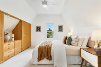Proper primary bedroom suite with soaking tub and shower.