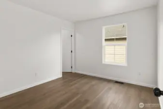 Another secondary bedroom, complete with a walk-in closet.