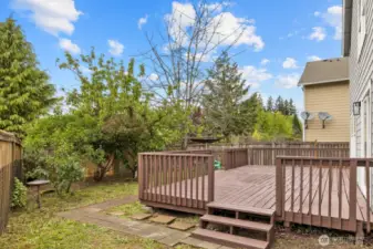 This sunny back deck is perfect for gatherings with friends!