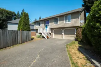 Extra long Driveway 57'. Parking for your RV and easy access to the 2 car garage