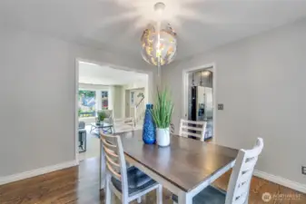 From the dining room, you’ll enjoy seamless access to both the living room and kitchen, creating an effortless flow for entertaining. The room’s versatile layout offers flexibility for everyday meals and special gatherings alike.