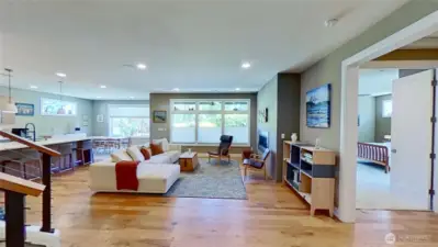 Open & light-filled great room floor plan with primary bedroom on the main level