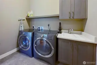 Spacious laundry room on main level.
