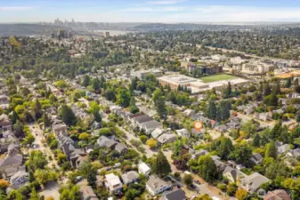 aerial photo looking south. You can see Lake Union and downtown Seattle from the photo. 98 walk score and 100 transit score! A short walk to light rail, grocery stores, cafes and everywhere you want to be. Only minutes to the UW, downtown, Amazon and 520. And located in the #1 sought after school cluster!