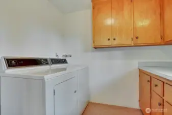 Washer/Dryer near kitchen.