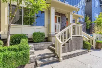 Front entry from the street. There is an assigned parking space right after the beautifully landscaped back courtyard.