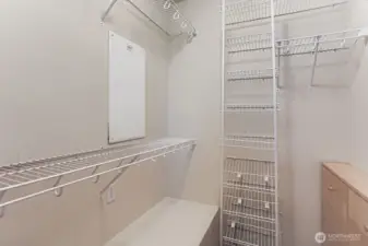 Primary bedroom's walk in closet.