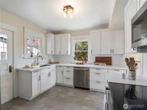 The kitchen has been beautifully remodeled.