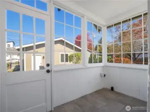 The sun porch is plumbed for washer and dryer.