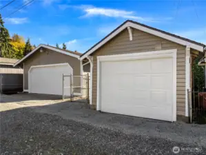 The two free-standing garages has easy alley access.