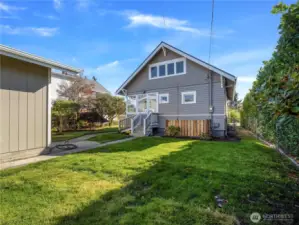 The green lush back yard is a great place to have a bbq or to sit and sip a cup of coffee.