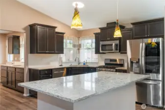 Just beyond the gleaming kitchen is the handy Butler's Pantry.