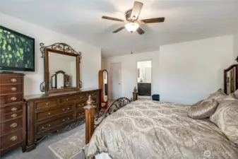 Your new primary suite provides another sanctuary from your cares, and a place for luxurious renewal. It's very generously sized, following the theme throughout the home.