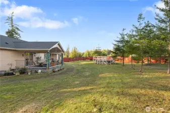 The expansive fenced portion of the backyard affords room for whatever you may want. And the above-ground poo with heater and water filtration can stay if you like!