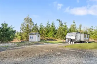 The building in the center is a laundry for use by guests staying in the RV spaces. This property has EVERYTHING imaginable in place!
