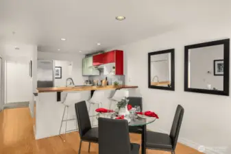 Custom-extended sit down kitchen bar countertop.