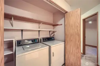 Hall Laundry Room. All Appliances stay! Hot water tank in this closet too