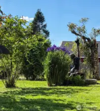 Peaceful fountain that birds love drinking from.
